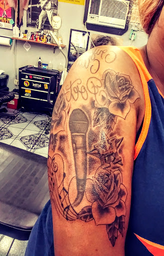 Tattoo Shop «Wizard Tattoo Studio», reviews and photos, 5780 S M L King Jr Pkwy, Beaumont, TX 77705, USA