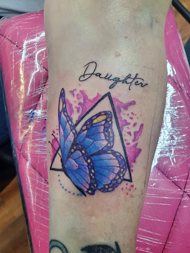 Explore chest piece tattoo ideas for women, creative tattoo ideas in Cocoa, available at Rorschach Tattoo Shop and Piercing Studio