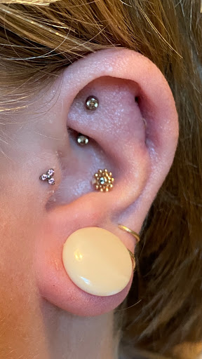 Explore tattoo ideas behind the ear tattoos, creative tattoo ideas in Oklahoma City, available at 23rd Street Body Piercing since 1995