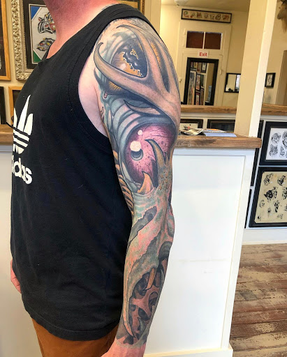 Explore full leg sleeve tattoo ideas, creative tattoo ideas in Arabi, available at Hidden Dimension Studio