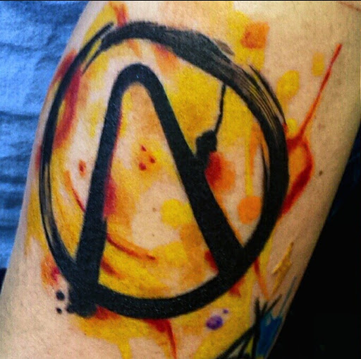 Explore hunting sleeve tattoo ideas, creative tattoo ideas in Benton, available at Spectrum Tattoo