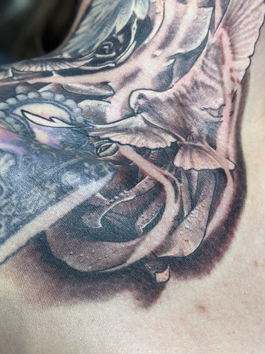 Explore outer forearm tattoos for men ideas, creative tattoo ideas in Longmont, available at Sharkys Paradise