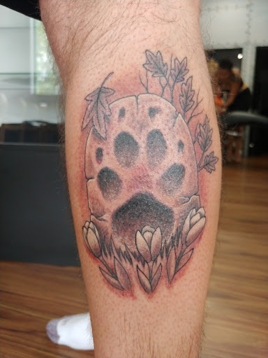 Explore torn skin tattoo ideas, creative tattoo ideas in Puyallup, available at The Tattoo Shop