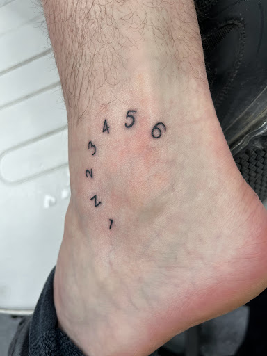 Explore cool finger tattoo ideas, creative tattoo ideas in La Vista, available at InkedUp Needles