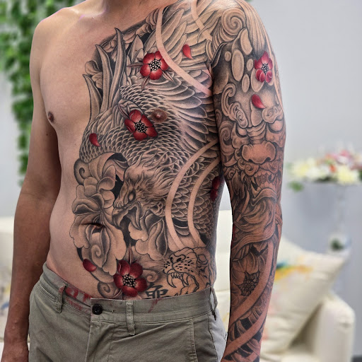 Explore star sleeve tattoo ideas, creative tattoo ideas in Garland, available at Infamous Art Studio