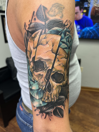 Explore snoopy tattoo ideas, creative tattoo ideas in Adrian, available at Good Life Tattoo Co.