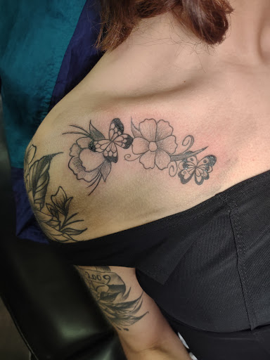 Explore shoulder tattoo ideas male, creative tattoo ideas in Williamston, available at Inkd Tattoo Parlor