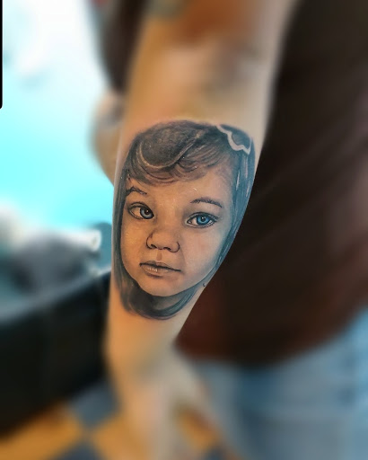 Explore western tattoo ideas for guys, creative tattoo ideas in Fall River, available at Fall River Tattoo Co