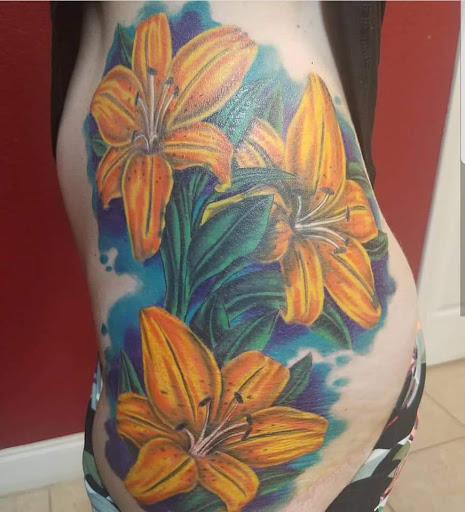 Explore gap filling tattoo ideas, creative tattoo ideas in Ocoee, available at Slaughterized Ink Tattoo and Piercing Studio