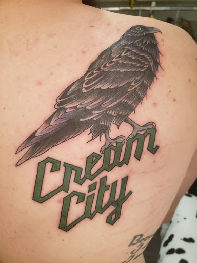 Explore outline tattoo ideas, creative tattoo ideas in Milwaukee, available at MANIA Tattoos Milwaukee