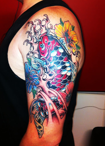 Explore tattoo ideas for roses, creative tattoo ideas in Washington, available at Angel & the Bad Man Tattoo