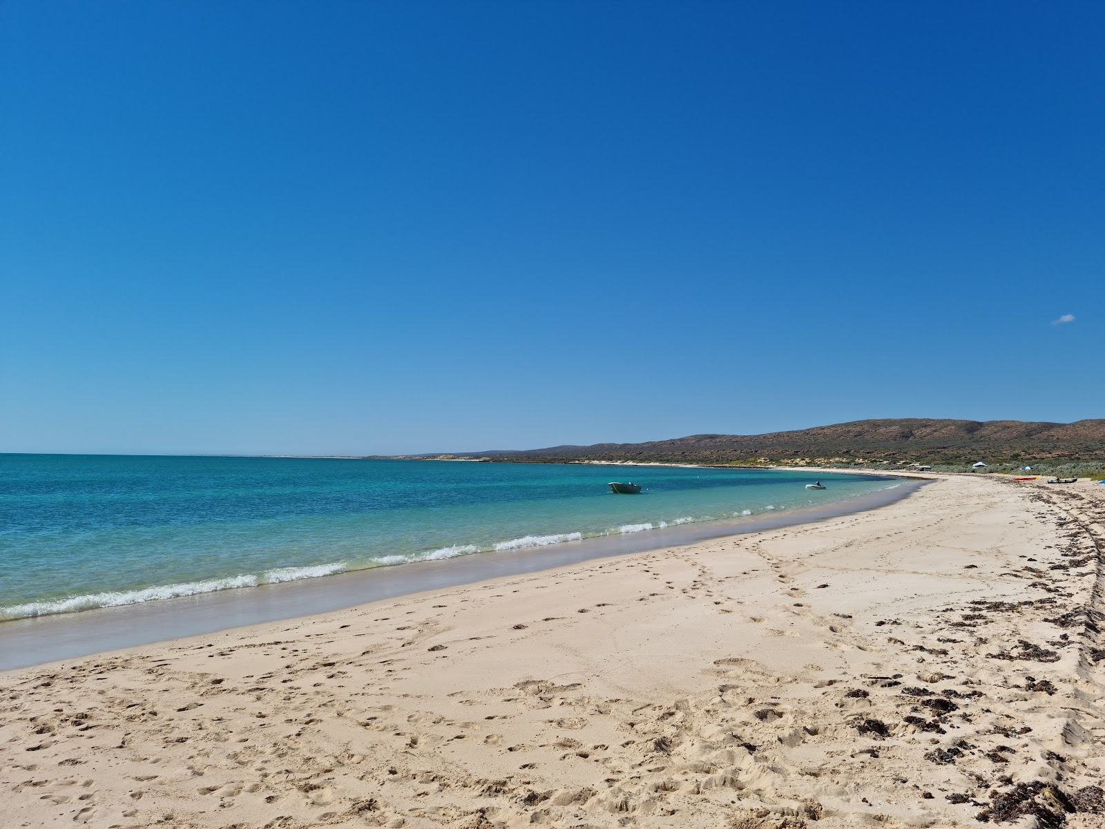 Foto di Winderabandi Point Beach con una superficie del sabbia beige fine