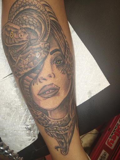 Explore lugia tattoo ideas, creative tattoo ideas in Russellville, available at BG Tattoos