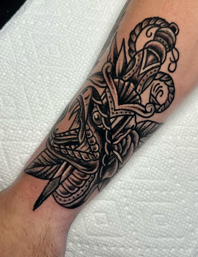 Explore butterfly and flower tattoo ideas, creative tattoo ideas in Greenville, available at The Gallery Tattoo Greenville