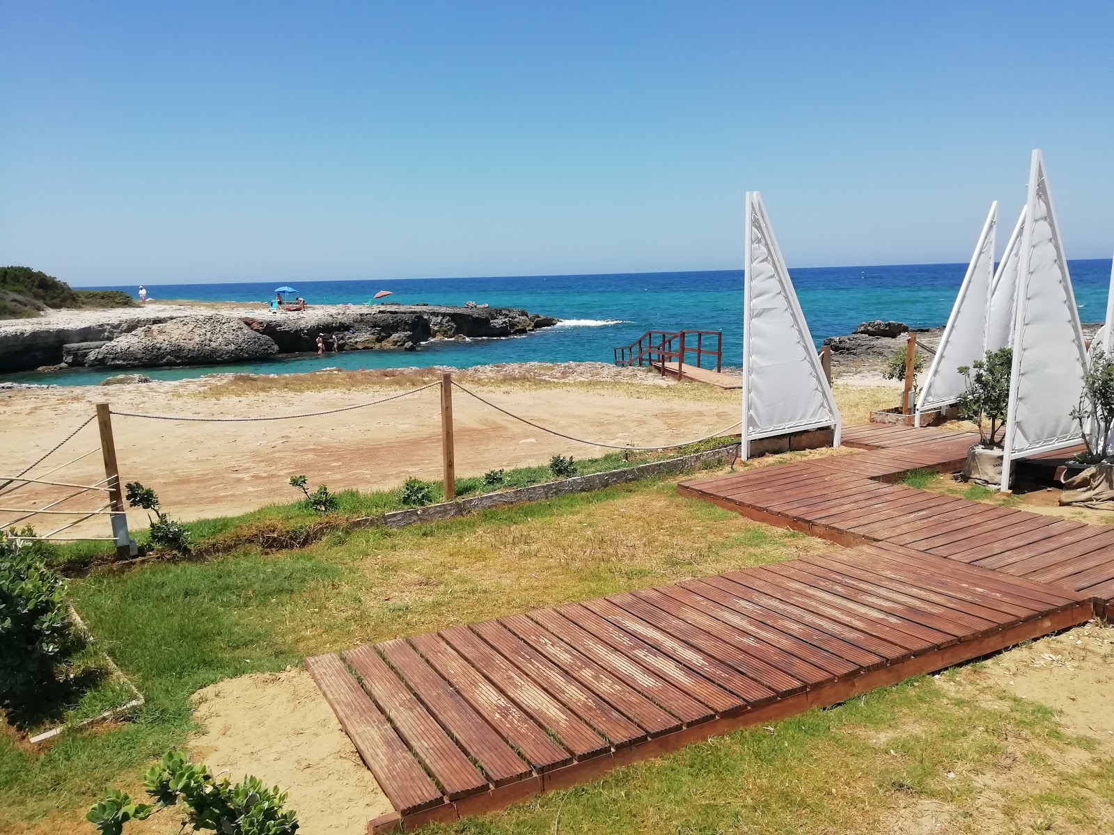 Photo de La Dolce Vita Beach avec baie spacieuse