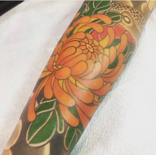 Explore family crest tattoo ideas, creative tattoo ideas in San Diego, available at Remington Tattoo Parlor