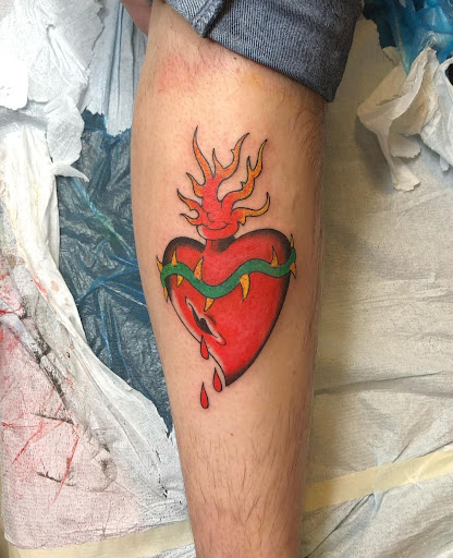 Explore female throat tattoo ideas, creative tattoo ideas in Ambler, available at Tattoo GalaxyAmbler Piercing & Custom Tattoos