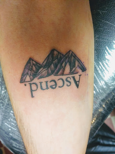 Explore courage tattoo ideas, creative tattoo ideas in Peoria, available at Mad Tattoo and Piercing