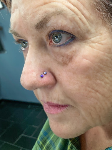 Explore female tattoo ideas, creative tattoo ideas in Springfield, available at Body Piercing By Qui Qui