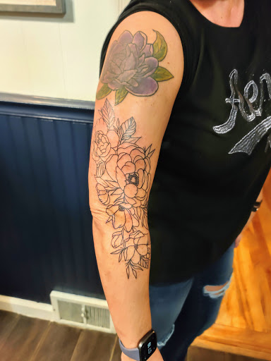 Explore aquarius tattoo ideas for men, creative tattoo ideas in Coeur D Alene, available at Jojos Tattoo & Body Piercing