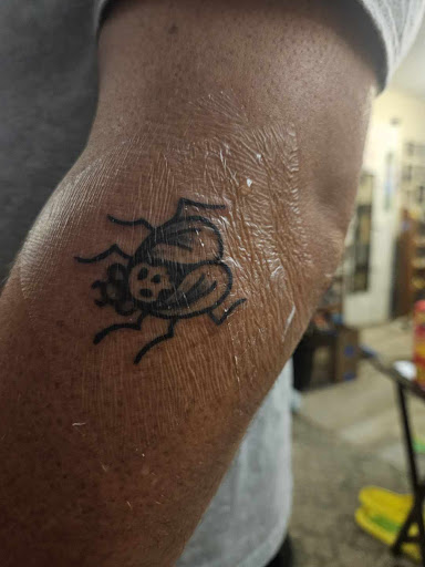 Explore tattoo ideas back arm, creative tattoo ideas in Orange Park, available at Fantasy Tattoo and Piercing