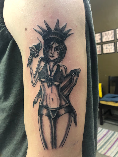 Explore small cardinal tattoo ideas, creative tattoo ideas in Calumet, available at Tattooing by Big Ben