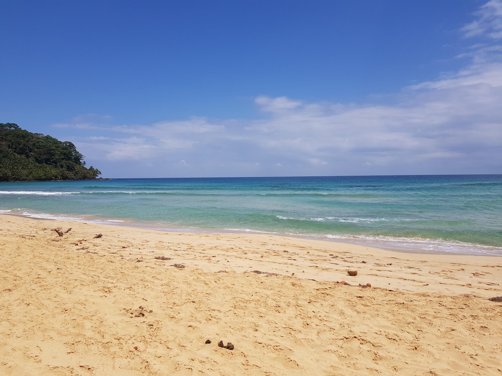 Foto van Wizard Beach met turquoise puur water oppervlakte