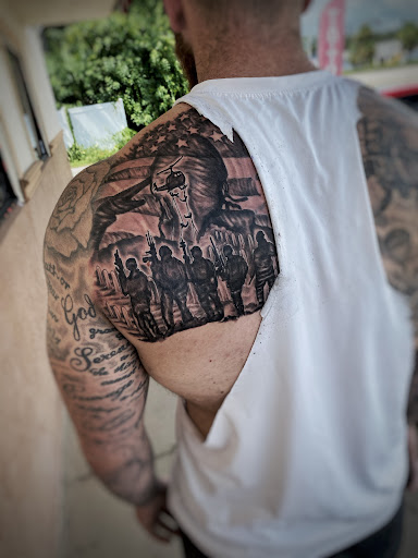 Explore full back tattoo ideas for guys, creative tattoo ideas in Fort Myers, available at Loyal 2 The Coil Tattoos & Piercings (Edison Mall Location Entrance F)