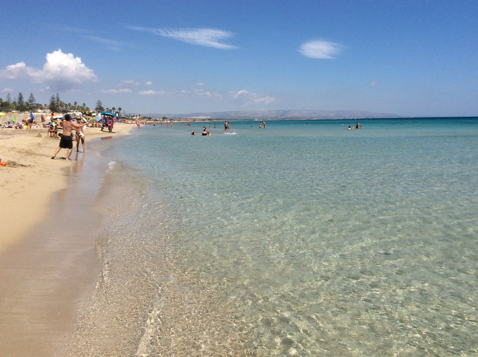 Photo of San Lorenzo Beach and the settlement