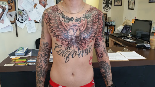 Explore black & white tattoo ideas, creative tattoo ideas in Watertown, available at Bare Knuckle Tattoo