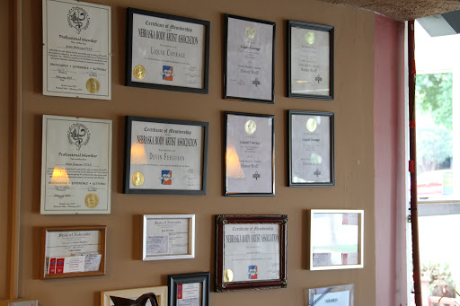 Explore tattoo cover up ideas for cross, creative tattoo ideas in Omaha, available at Liquid Courage Tattoos