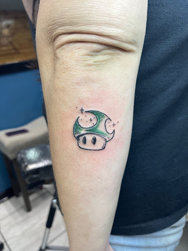 Explore small black tattoo ideas, creative tattoo ideas in Foley, available at Symbolic Ink Tattoo Studio