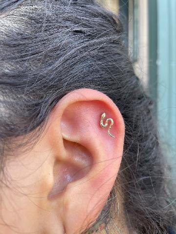 Explore solar eclipse tattoo ideas, creative tattoo ideas in Puyallup, available at Evergreen Body Mod