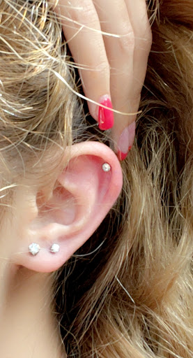 Explore arm sleeve tattoo ideas woman, creative tattoo ideas in San Diego, available at Sideshow Tattoo and Piercing