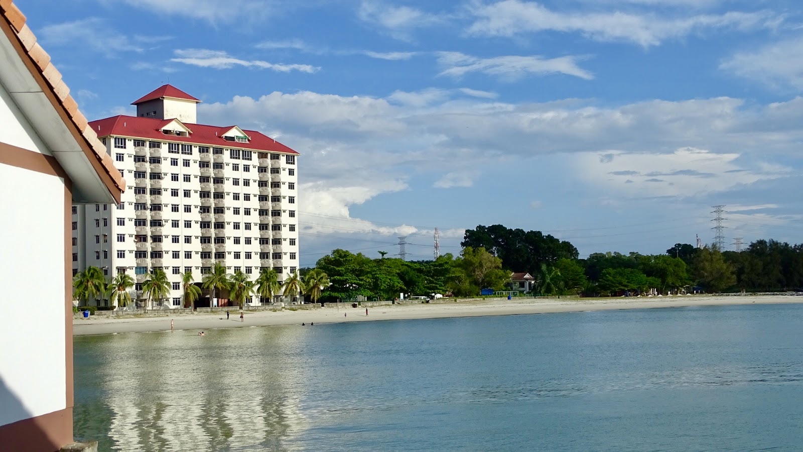 Fotografija Tanjung Beach in naselje