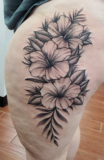 Explore female tattoo ideas ribs, creative tattoo ideas in Toledo, available at 4 Nineteen Ink