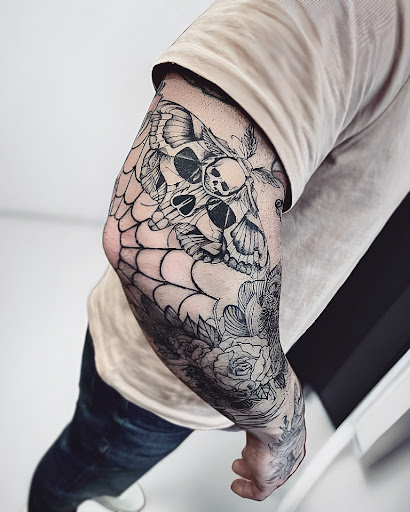 Explore rat fink tattoo ideas, creative tattoo ideas in Huntington, available at Timeless Tattoo Gallery