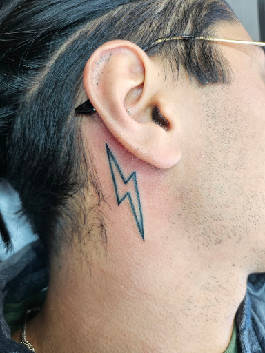 Explore lung cancer ribbon tattoo ideas, creative tattoo ideas in Visalia, available at The Onis Club Tattoo