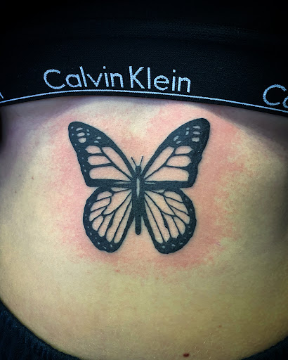 Explore may birth flower tattoo ideas, creative tattoo ideas in Canfield, available at Black Rose Tattoo Studio