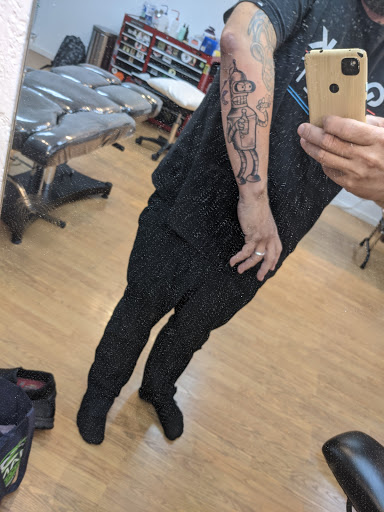 Explore gangsta tattoo sleeve ideas, creative tattoo ideas in Lahaina, available at Sweet Trade Tattoo