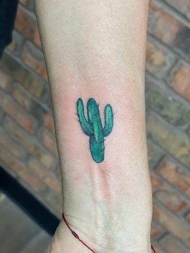 Explore tomahawk tattoo ideas, creative tattoo ideas in Houston, available at The Dark Anchor