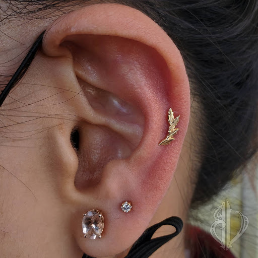 Explore tattoo ideas for women shoulder, creative tattoo ideas in Redding, available at J Varnum Body Arts Single Track Tattoo