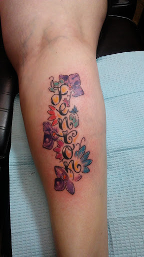 Explore baby feet tattoo ideas, creative tattoo ideas in Storm Lake, available at Alley Cat Tattoo