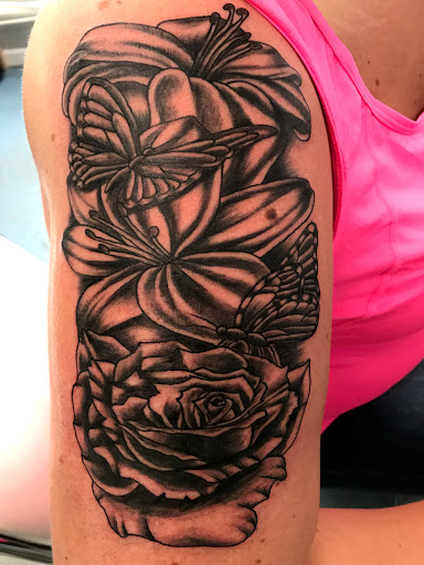 Explore script tattoo ideas for guys, creative tattoo ideas in Muncie, available at The Tattoo Studio