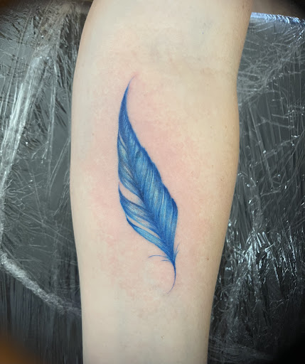 Explore dirt bike tattoo ideas, creative tattoo ideas in Burlington, available at Insidious Studios