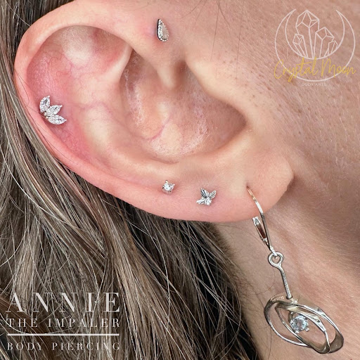 Explore wedding ring tattoo ideas male, creative tattoo ideas in Bloomington, available at Crystal Moon Body Arts