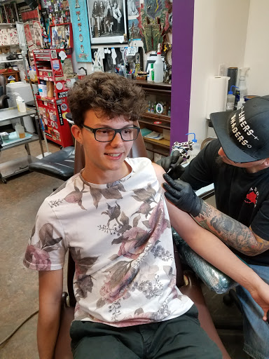 Tattoo Shop «Fat Brothers Productions», reviews and photos, 2953 E Highland Rd, Highland Charter Twp, MI 48356, USA