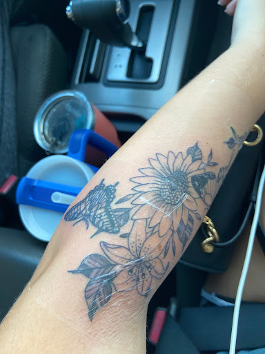 Explore flower arm sleeve tattoo ideas, creative tattoo ideas in Saint Petersburg, available at Foolish Pride Tattoo Co.