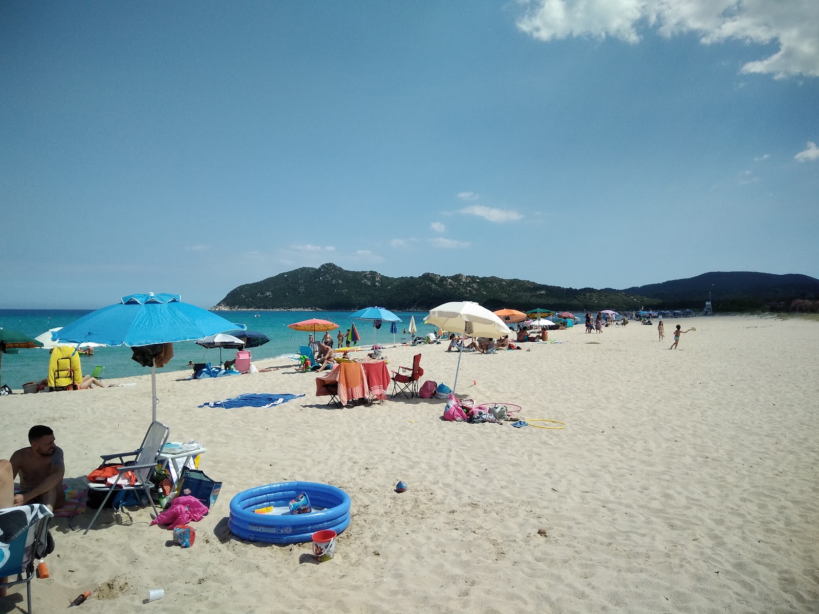 Foto de Praia de Marina di San Pietro - lugar popular entre os apreciadores de relaxamento