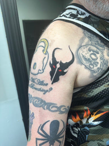 Find tattoo ideas for new moms for your next unique tattoo in Aurora at Ronin Tattoo Studio INC